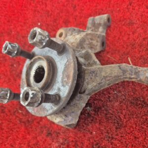 Поворотный кулак левый Mazda 323 BJ
